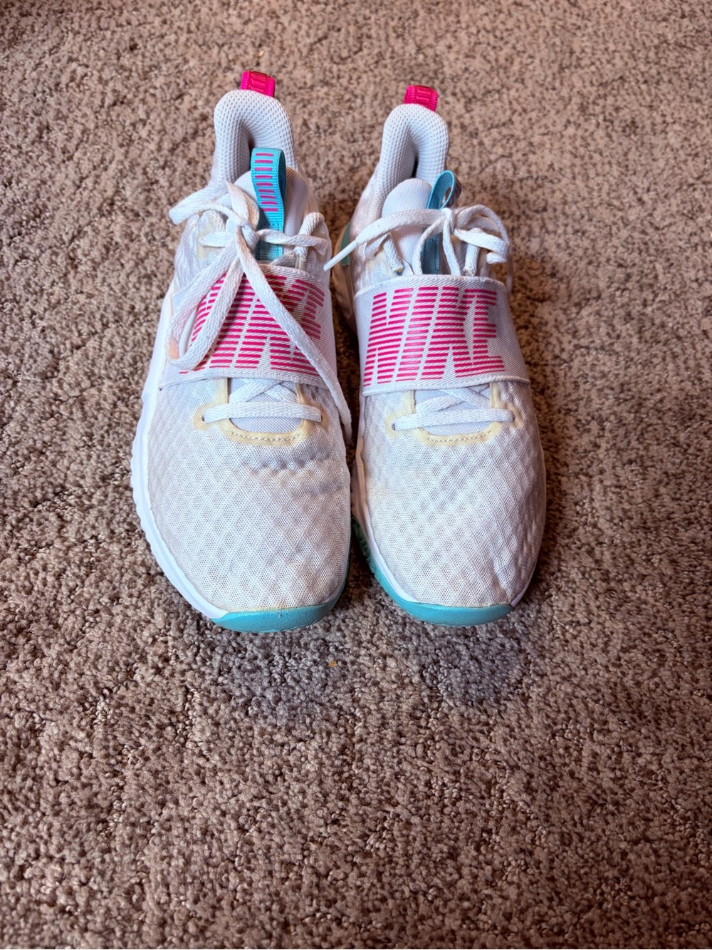 Nike Women’s White Athletic Sneakers with Pink and Teal Accents